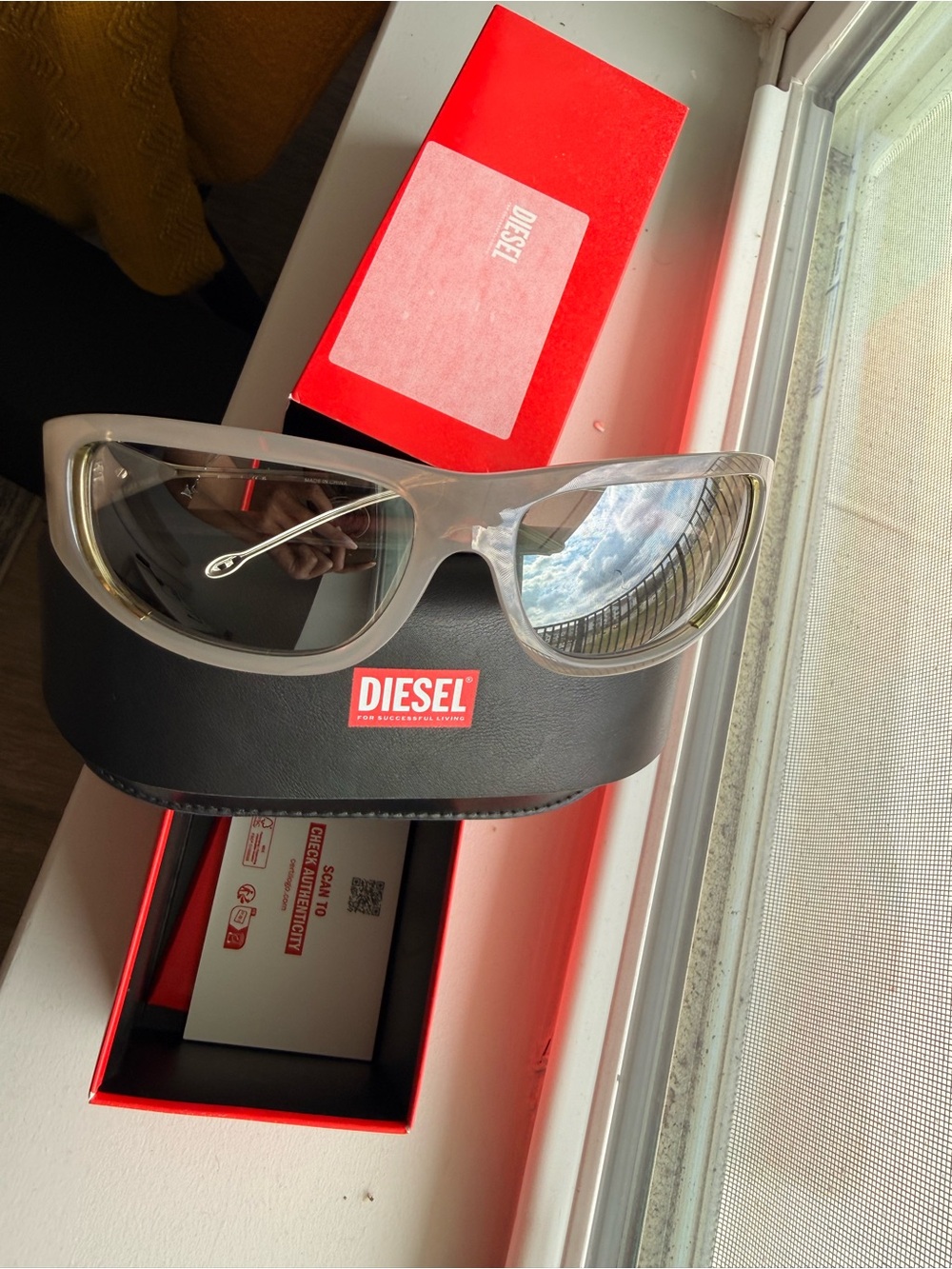Diesel DL3001 Translucent Clear Cat-Eye Sunglasses with Gray Lenses
